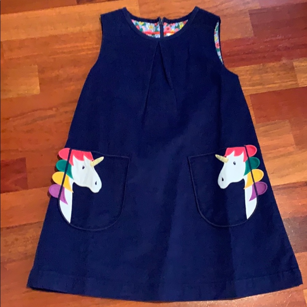 Girls blue corduroy dress, unicorn pocket detail